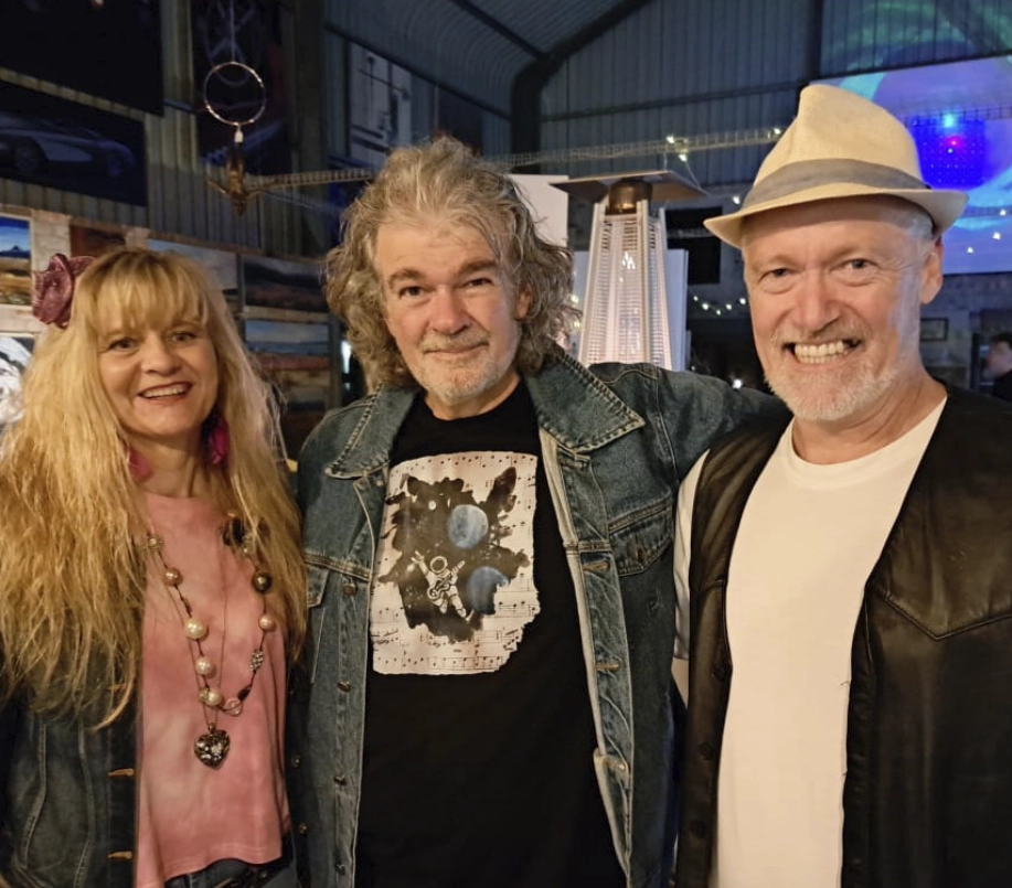 Daniel (far right) with wife Melanie and artist, Ian Visser